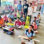 Distribution of cricket kits to Orphans by Sai Nine.